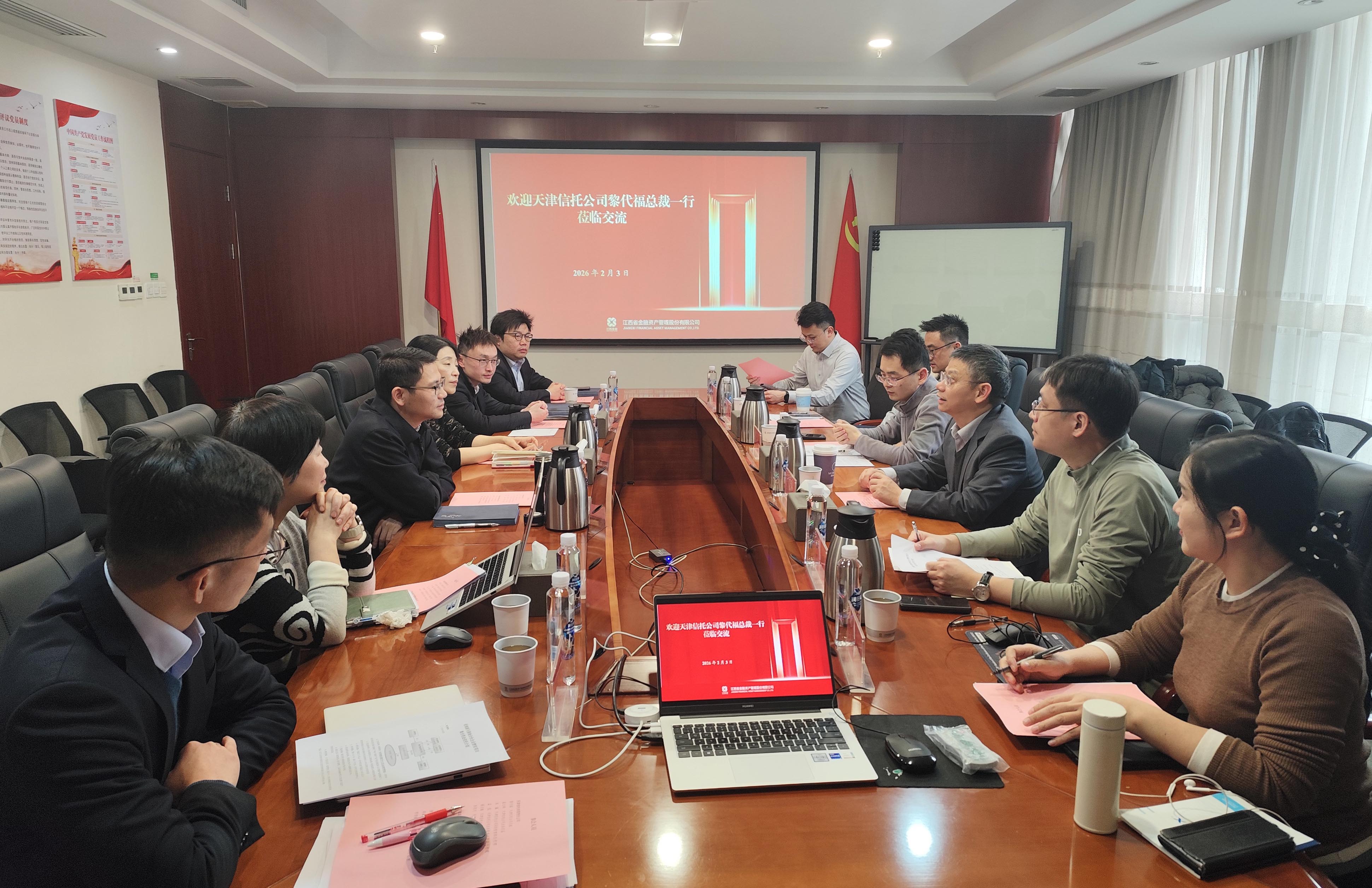 天津信托公司总裁黎代福一行到访江西金资公司